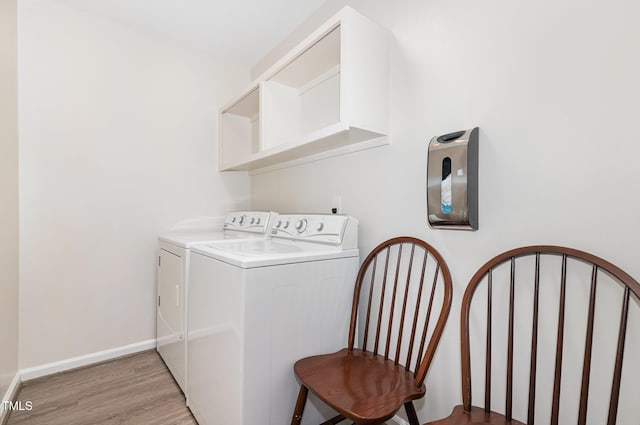 1520 Woodcroft Dr, Raleigh, NC 27609 - laundry area featuring independent washer and dryer and light wood finished floors