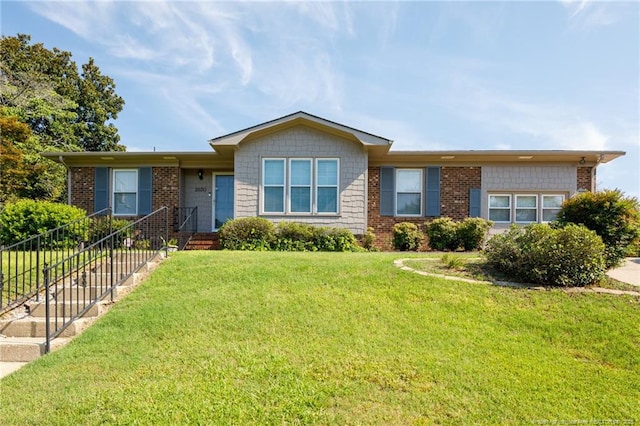 2630 Dartmouth Dr, Fayetteville, NC 28304 - ranch-style home featuring a front yard and brick siding