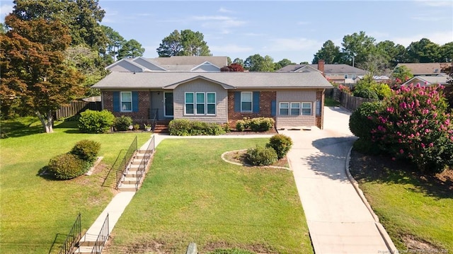 2630 Dartmouth Dr, Fayetteville, NC 28304 - ranch-style house with driveway and brick siding