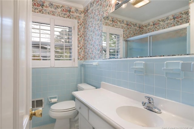 2630 Dartmouth Dr, Fayetteville, NC 28304 - full bathroom featuring wallpapered walls, ornamental molding, vanity, an enclosed shower, and wainscoting