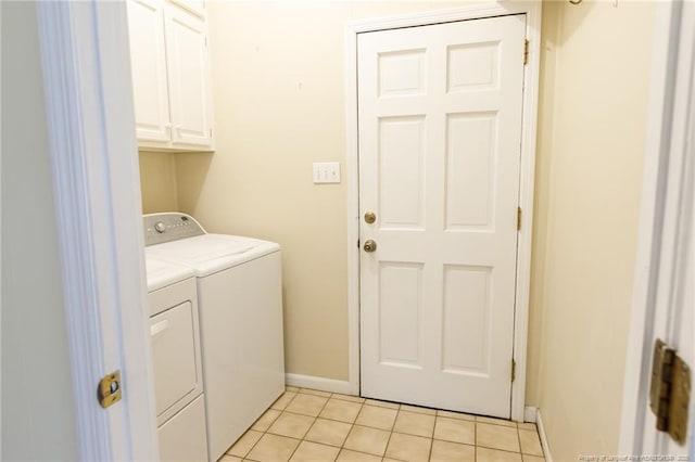2630 Dartmouth Dr, Fayetteville, NC 28304 - laundry room featuring separate washer and dryer, cabinet space, and light tile patterned floors