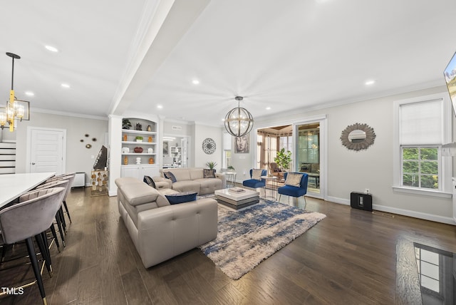 7741 Wilderness Rd, Raleigh, NC 27613 - living area with a chandelier, ornamental molding, recessed lighting, dark wood finished floors, and stairs
