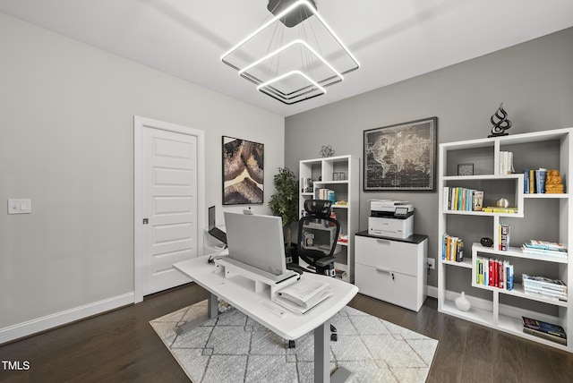 7741 Wilderness Rd, Raleigh, NC 27613 - home office with a chandelier and wood finished floors