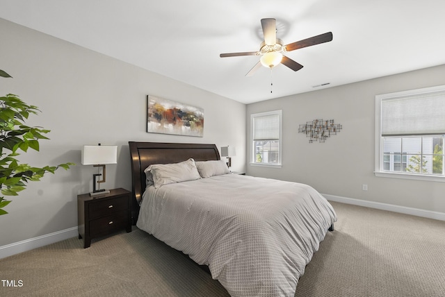 7741 Wilderness Rd, Raleigh, NC 27613 - bedroom featuring light colored carpet and ceiling fan