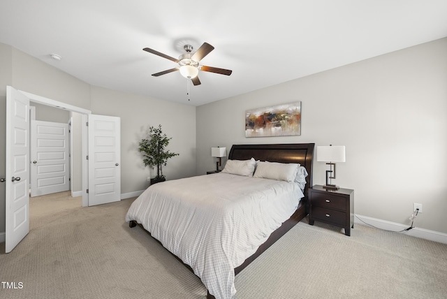 7741 Wilderness Rd, Raleigh, NC 27613 - carpeted bedroom featuring baseboards and ceiling fan