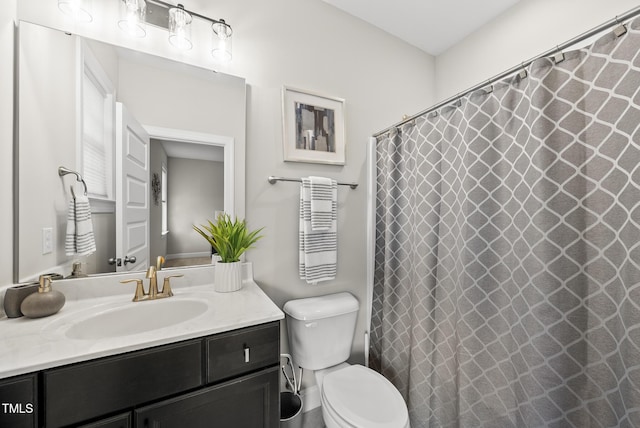 7741 Wilderness Rd, Raleigh, NC 27613 - full bath with vanity and toilet