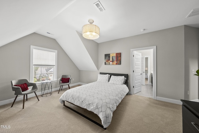 7741 Wilderness Rd, Raleigh, NC 27613 - bedroom featuring light carpet and vaulted ceiling