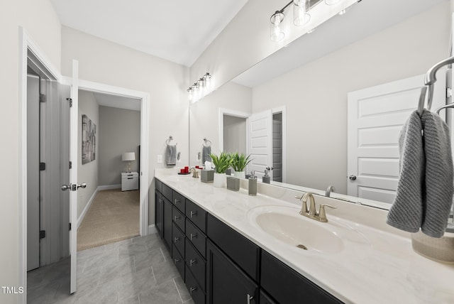 7741 Wilderness Rd, Raleigh, NC 27613 - bathroom with vanity and baseboards