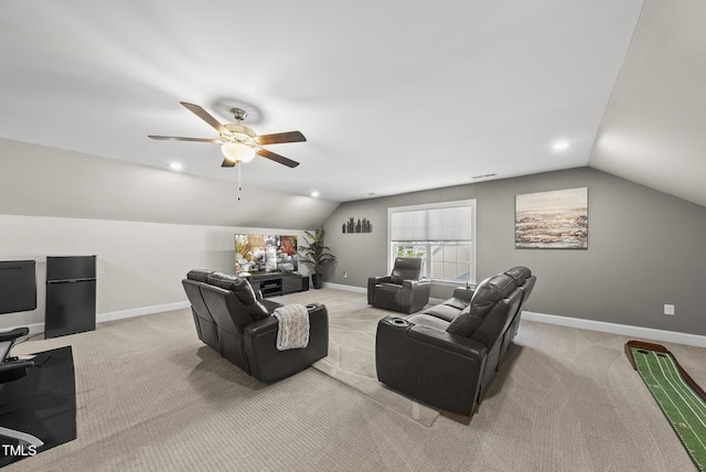 7741 Wilderness Rd, Raleigh, NC 27613 - living room with lofted ceiling, ceiling fan, carpet flooring, and recessed lighting