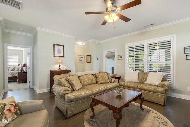 2461 Patriot Bluffs Dr, Fuquay Varina, NC 27526 - living area featuring dark wood finished floors, ceiling fan, and crown molding