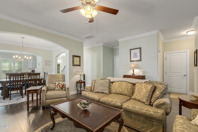 2461 Patriot Bluffs Dr, Fuquay Varina, NC 27526 - living area with a ceiling fan, arched walkways, dark wood finished floors, crown molding, and a chandelier