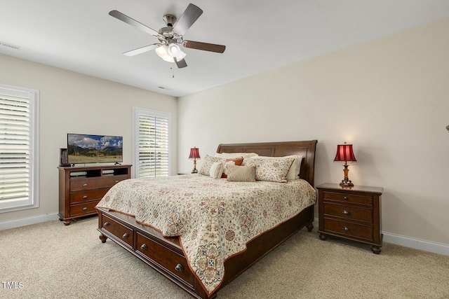 2461 Patriot Bluffs Dr, Fuquay Varina, NC 27526 - bedroom featuring light carpet and ceiling fan