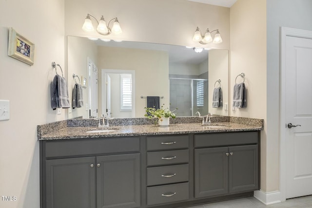 2461 Patriot Bluffs Dr, Fuquay Varina, NC 27526 - bathroom featuring a stall shower and double vanity