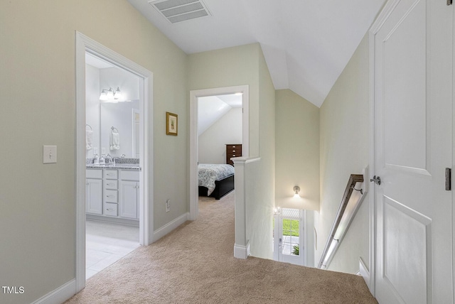 2461 Patriot Bluffs Dr, Fuquay Varina, NC 27526 - hall with light carpet and vaulted ceiling