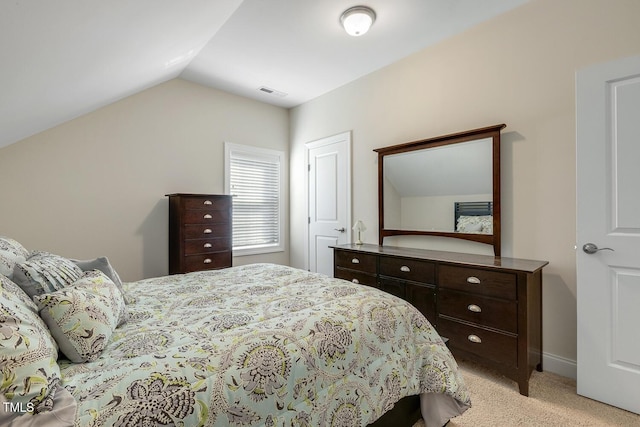 2461 Patriot Bluffs Dr, Fuquay Varina, NC 27526 - bedroom featuring light carpet and lofted ceiling
