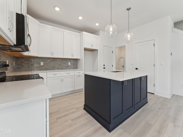 812 Barlow Dr Unit 255, Knightdale, NC 27545 - kitchen featuring white cabinetry, stove, tasteful backsplash, light countertops, and recessed lighting