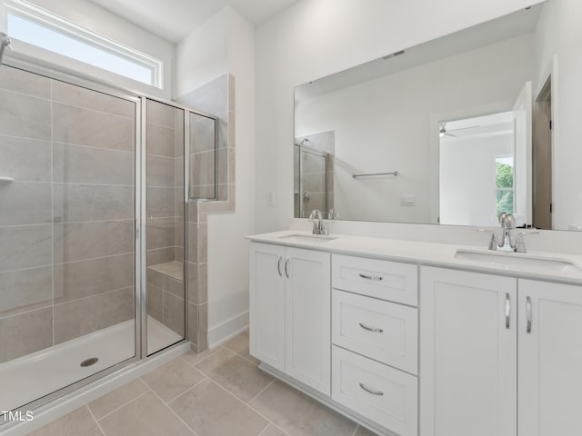 812 Barlow Dr Unit 255, Knightdale, NC 27545 - full bathroom with healthy amount of natural light, double vanity, a shower stall, and tile patterned flooring