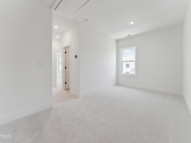 812 Barlow Dr Unit 255, Knightdale, NC 27545 - spare room with light carpet, attic access, and recessed lighting