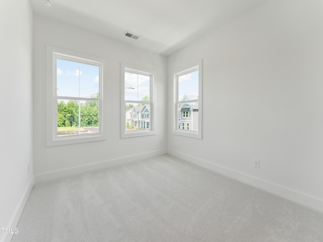 812 Barlow Dr Unit 255, Knightdale, NC 27545 - carpeted spare room with plenty of natural light