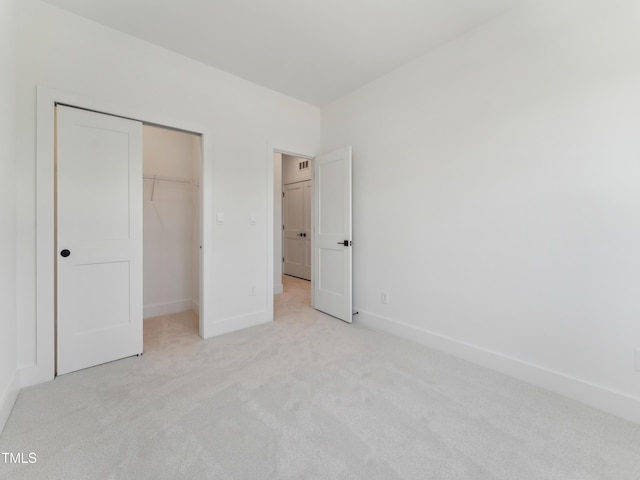 812 Barlow Dr Unit 255, Knightdale, NC 27545 - unfurnished bedroom with light carpet and a closet