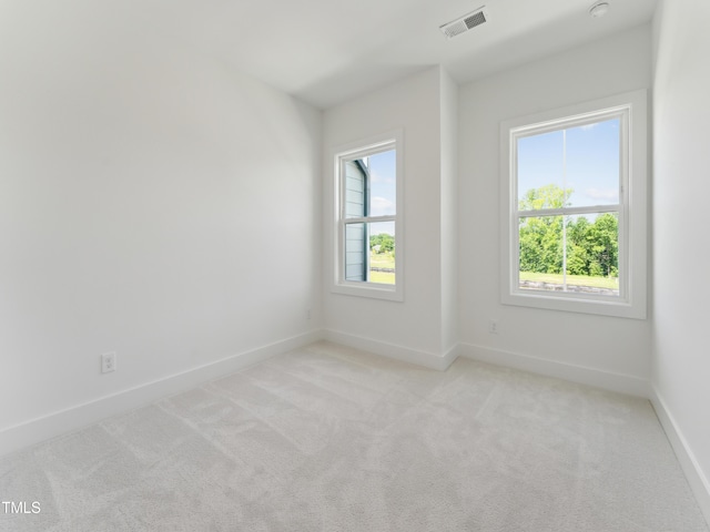 812 Barlow Dr Unit 255, Knightdale, NC 27545 - unfurnished room with light carpet and baseboards