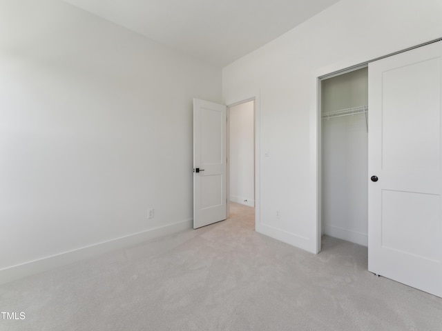 812 Barlow Dr Unit 255, Knightdale, NC 27545 - unfurnished bedroom featuring light colored carpet and a closet