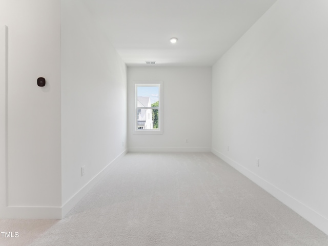 812 Barlow Dr Unit 255, Knightdale, NC 27545 - unfurnished room featuring baseboards and light colored carpet
