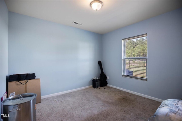 443 Waterfall Rd, Henderson, NC 27537 - unfurnished bedroom with carpet and baseboards