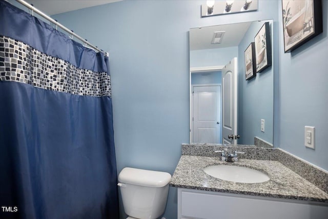 443 Waterfall Rd, Henderson, NC 27537 - bathroom featuring vanity and toilet