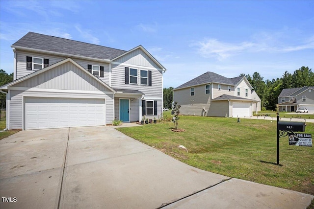 443 Waterfall Rd, Henderson, NC 27537 - traditional home with driveway, a front yard, and board and batten siding