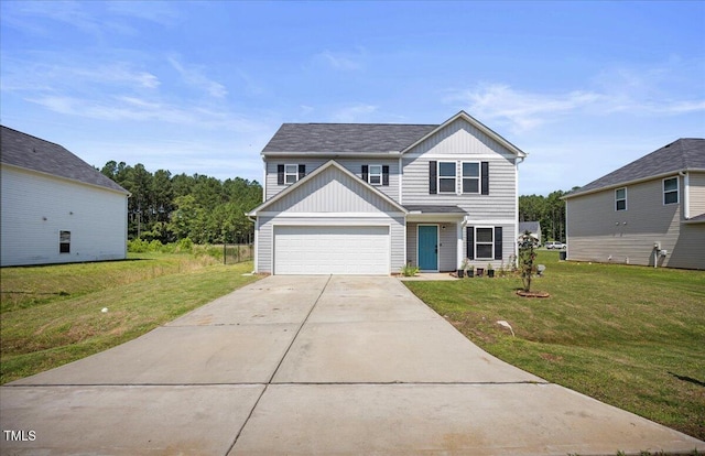 443 Waterfall Rd, Henderson, NC 27537 - traditional-style home featuring a front lawn, concrete driveway, and board and batten siding