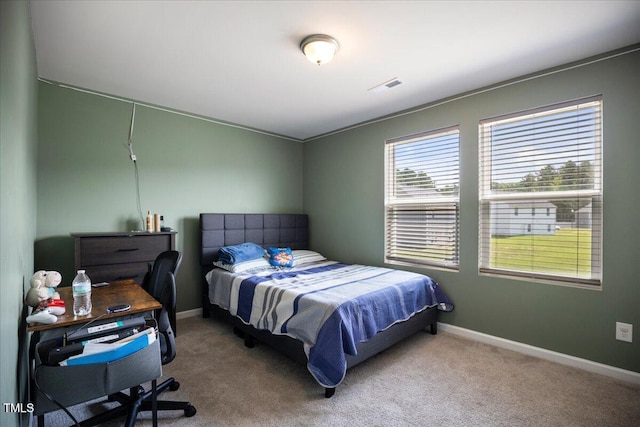 443 Waterfall Rd, Henderson, NC 27537 - carpeted bedroom featuring baseboards