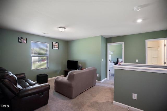 443 Waterfall Rd, Henderson, NC 27537 - living room with light colored carpet and baseboards