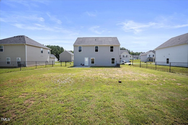 443 Waterfall Rd, Henderson, NC 27537 - back of house with a fenced backyard and a residential view