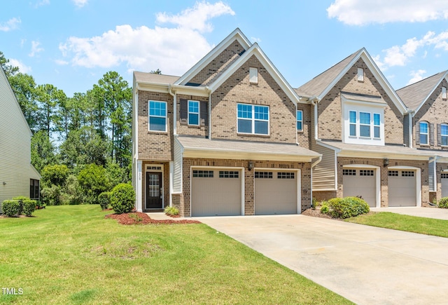 508 Durants Neck Ln, Morrisville, NC 27560 - view of front facade featuring an attached garage, brick siding, a front yard, and driveway