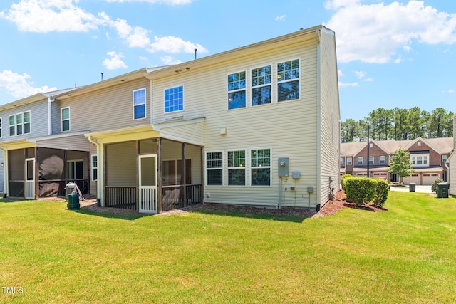 508 Durants Neck Ln, Morrisville, NC 27560 - back of property with a sunroom and a lawn