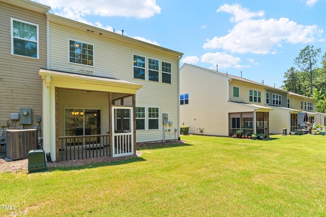 508 Durants Neck Ln, Morrisville, NC 27560 - back of house with a sunroom and a lawn