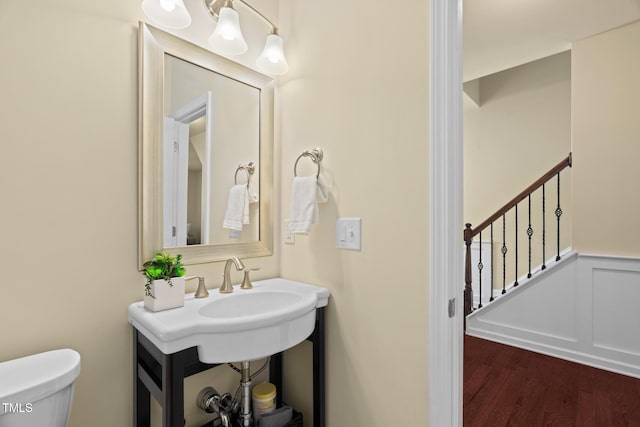 508 Durants Neck Ln, Morrisville, NC 27560 - half bathroom with wood finished floors and wainscoting