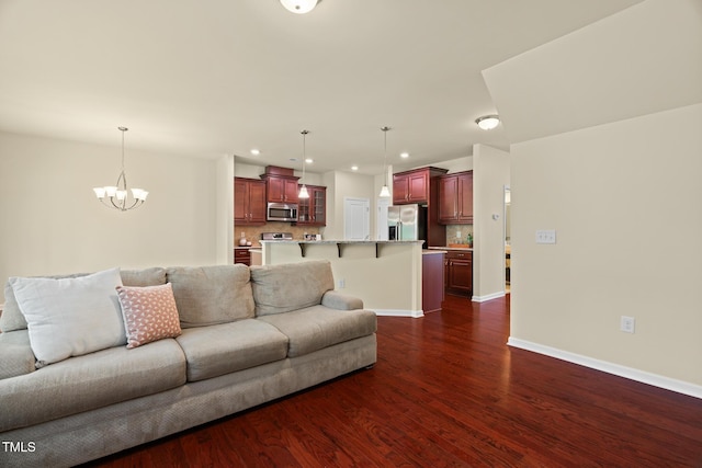 508 Durants Neck Ln, Morrisville, NC 27560 - living area featuring dark wood-style flooring, recessed lighting, and a chandelier