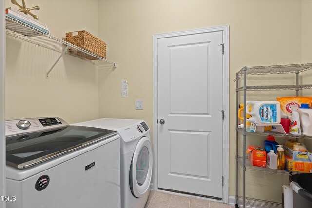 508 Durants Neck Ln, Morrisville, NC 27560 - laundry area with washer and dryer and light tile patterned floors