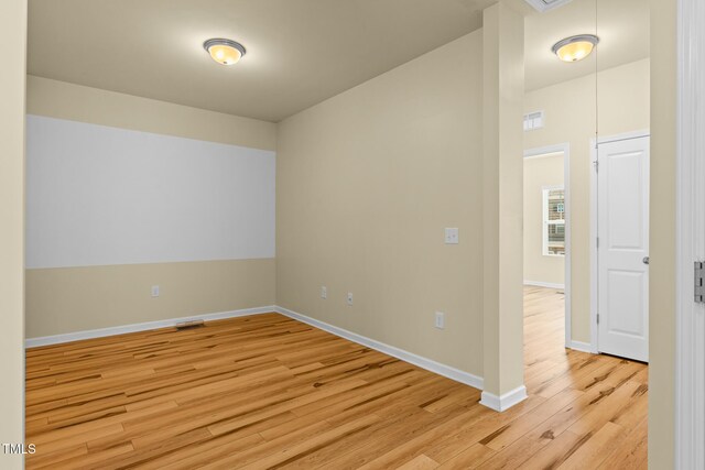 508 Durants Neck Ln, Morrisville, NC 27560 - empty room with light wood finished floors and baseboards