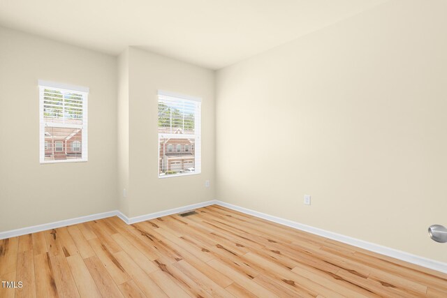 508 Durants Neck Ln, Morrisville, NC 27560 - empty room featuring light wood finished floors and plenty of natural light