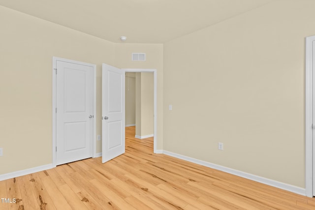 508 Durants Neck Ln, Morrisville, NC 27560 - unfurnished bedroom with light wood finished floors and baseboards
