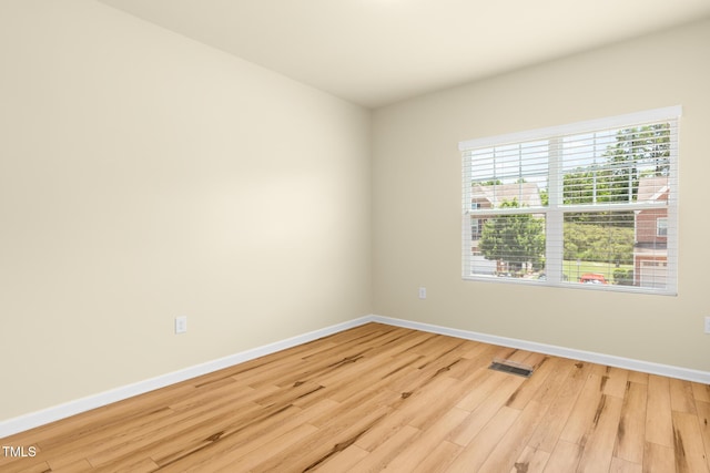 508 Durants Neck Ln, Morrisville, NC 27560 - empty room with wood finished floors and healthy amount of natural light