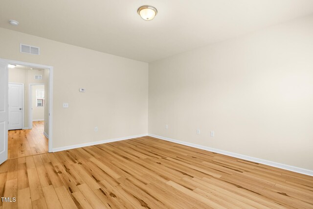 508 Durants Neck Ln, Morrisville, NC 27560 - unfurnished room with light wood-type flooring and a smoke detector