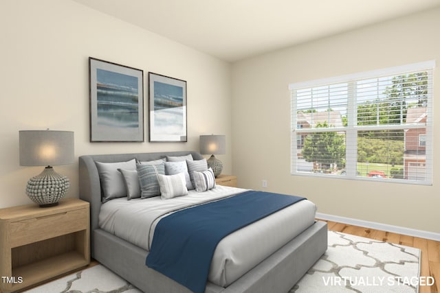 508 Durants Neck Ln, Morrisville, NC 27560 - bedroom featuring wood finished floors and baseboards