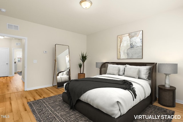 508 Durants Neck Ln, Morrisville, NC 27560 - bedroom featuring light wood-type flooring and baseboards