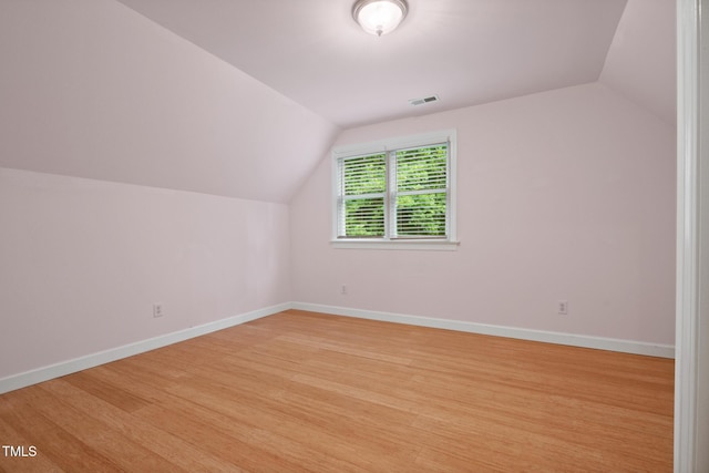 9903 Oak Hollow Rd, Chapel Hill, NC 27516 - additional living space with lofted ceiling and light wood-style floors