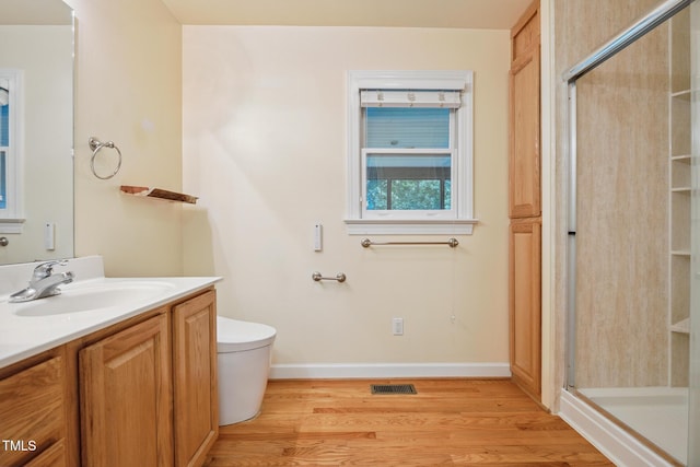 9903 Oak Hollow Rd, Chapel Hill, NC 27516 - bathroom featuring vanity, wood finished floors, and a stall shower