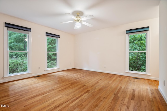 9903 Oak Hollow Rd, Chapel Hill, NC 27516 - empty room featuring light wood-style flooring and a ceiling fan